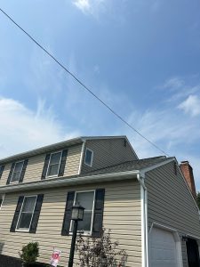 house wrap was installed over the paneling wall, and the siding was reinstalled, street view